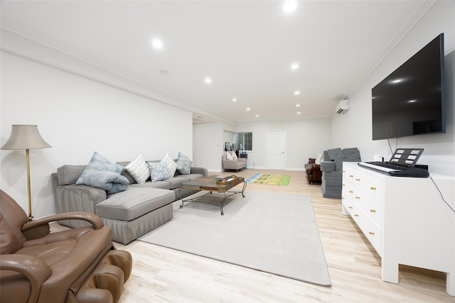 living area with ornamental molding, light wood-type flooring, baseboards, and recessed lighting