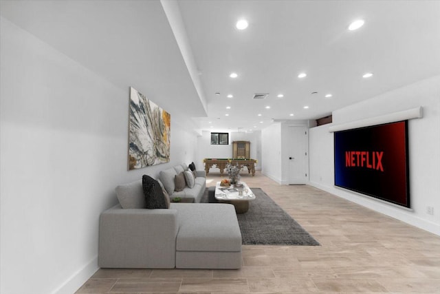 953 Tilden St, Bronx, NY 10469 - living area featuring light wood-type flooring, baseboards, visible vents, and recessed lighting