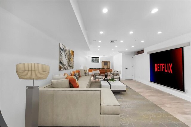 953 Tilden St, Bronx, NY 10469 - living area with light wood-style floors, visible vents, and recessed lighting