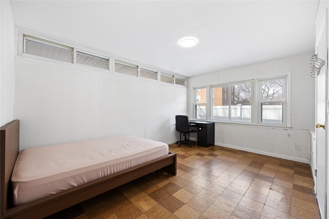 bedroom with baseboards