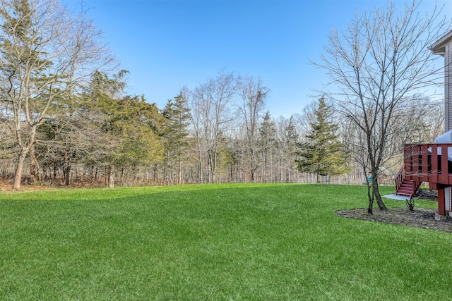 view of yard featuring a deck