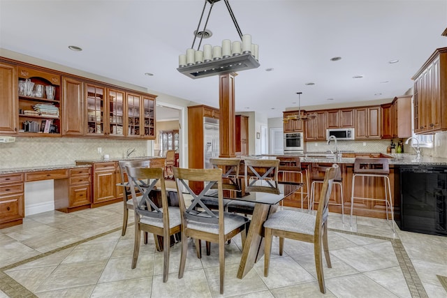 dining room featuring beverage cooler, recessed lighting, and light tile patterned floors