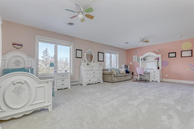 bedroom featuring light carpet, baseboard heating, and a ceiling fan