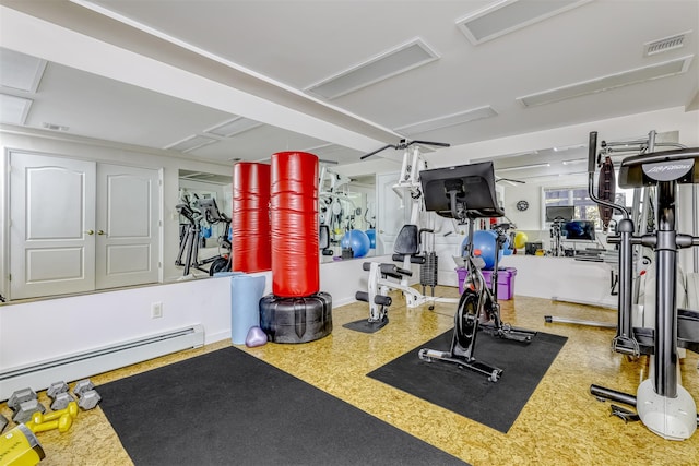workout room with baseboard heating and visible vents
