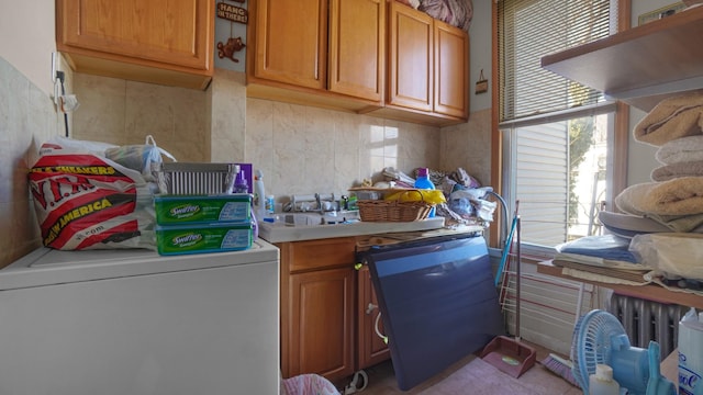 clothes washing area featuring washer / clothes dryer