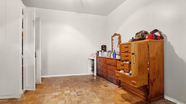 bedroom featuring baseboards