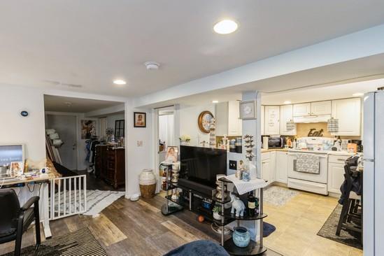 living area featuring recessed lighting and light wood-style flooring