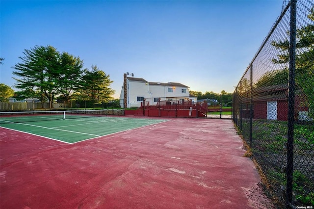 view of sport court featuring community basketball court and fence