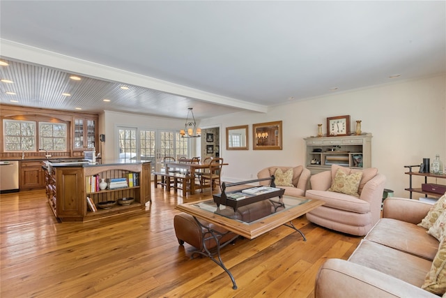 living room with a chandelier, light wood-type flooring, beam ceiling, and recessed lighting