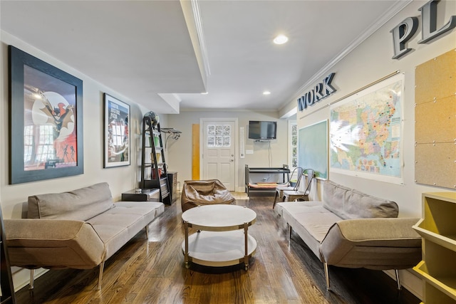 living area featuring crown molding, wood finished floors, and recessed lighting