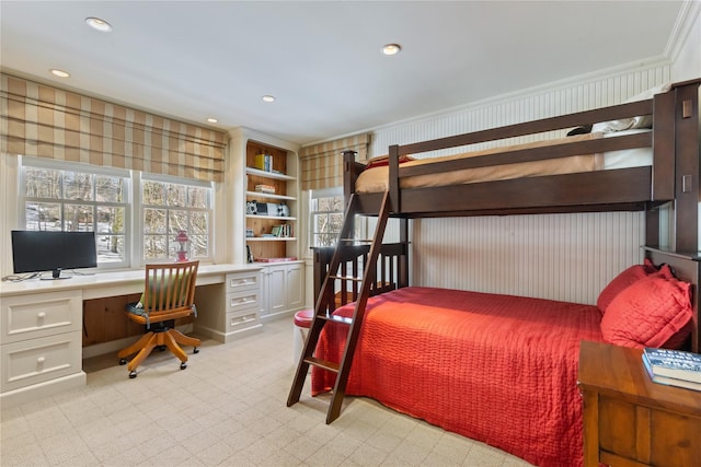 bedroom with recessed lighting and built in desk