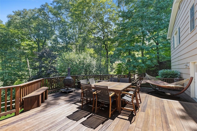 deck featuring outdoor dining area