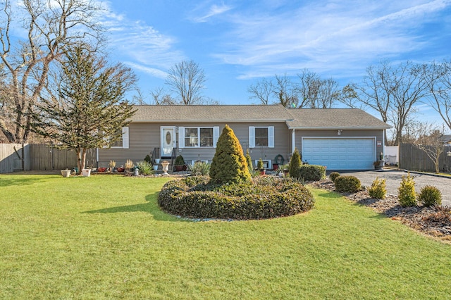 ranch-style house featuring driveway, an attached garage, fence, and a front yard