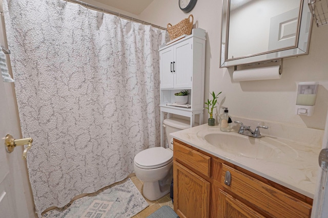 full bath featuring toilet, tile patterned floors, and vanity