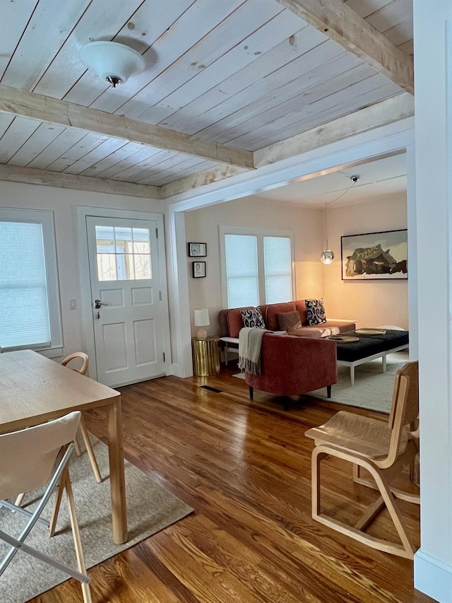 entryway featuring wood ceiling, beam ceiling, and wood finished floors