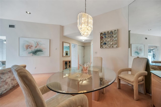 dining area featuring light carpet, an inviting chandelier, visible vents, and recessed lighting