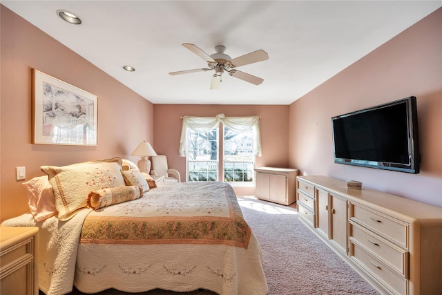 bedroom with recessed lighting, a ceiling fan, and light colored carpet