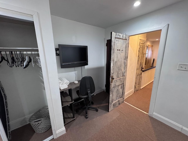 carpeted office space with recessed lighting and baseboards