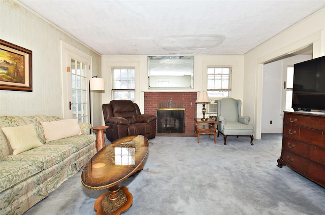 living area with a fireplace and carpet flooring