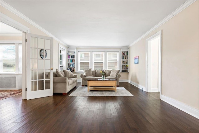 unfurnished living room featuring baseboards, radiator, dark wood-style flooring, and crown molding