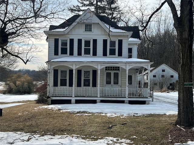 view of front of house featuring board and batten siding and covered porch