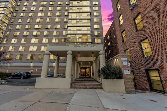 view of property at dusk