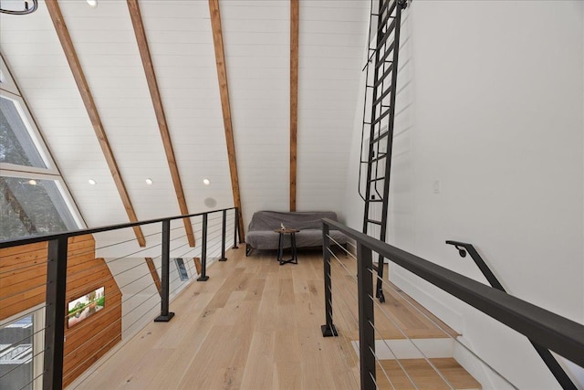 exercise area with light wood-type flooring