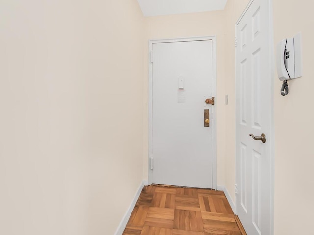 doorway with baseboards