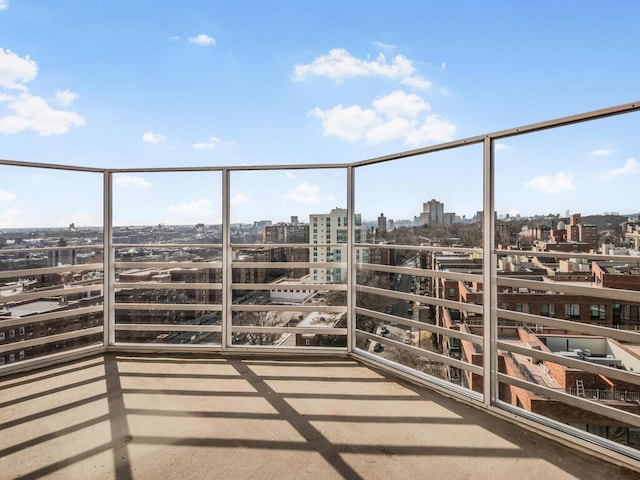 balcony featuring a city view