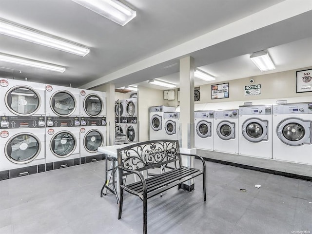 shared laundry area featuring stacked washer / dryer and independent washer and dryer