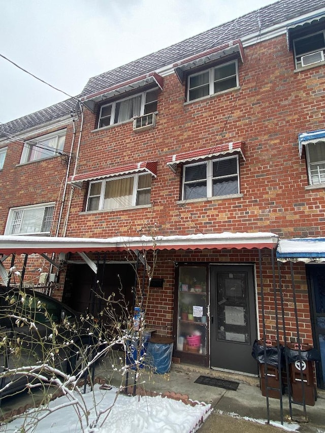 view of front of home with brick siding