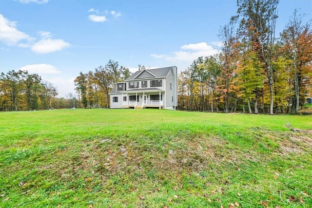 exterior space with a yard and a porch