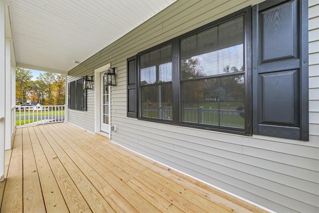 wooden deck featuring a porch