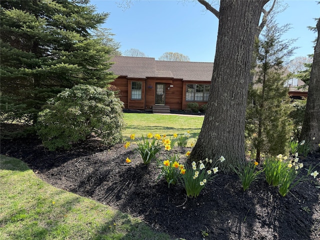 515 Corey Creek Ln, Southold, NY 11971 - view of front of property with roof with shingles, a front yard, and entry steps
