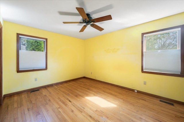 515 Corey Creek Ln, Southold, NY 11971 - unfurnished room with visible vents, a healthy amount of sunlight, and light wood-type flooring