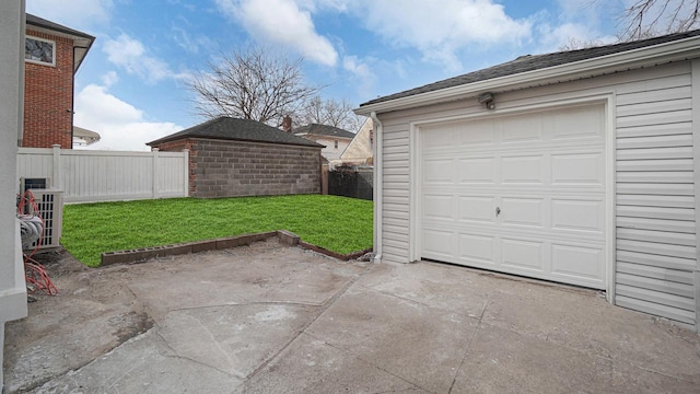 garage featuring fence