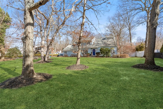 view of yard featuring fence