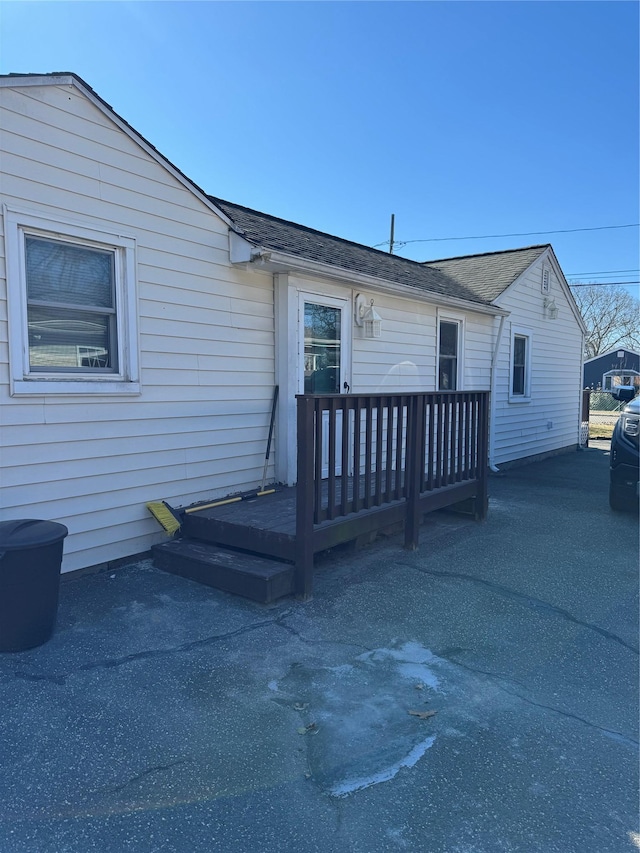 exterior space with a wooden deck