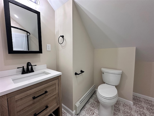 bathroom with toilet, vanity, baseboards, vaulted ceiling, and baseboard heating