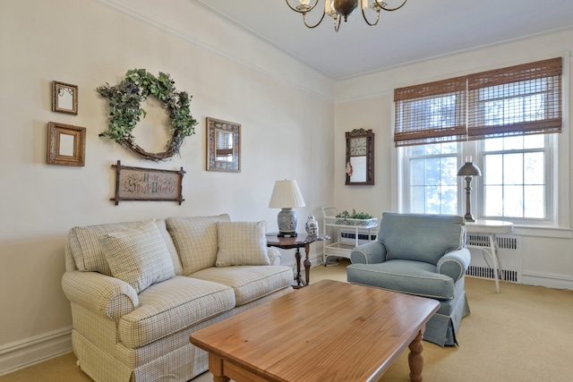 living room featuring carpet, radiator heating unit, baseboards, and an inviting chandelier