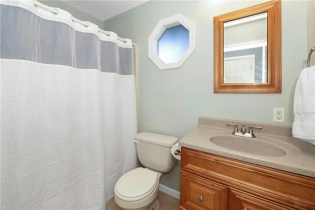 full bath featuring tile patterned flooring, vanity, and toilet