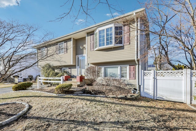 split foyer home with fence