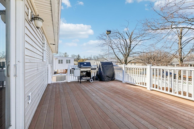 deck featuring grilling area