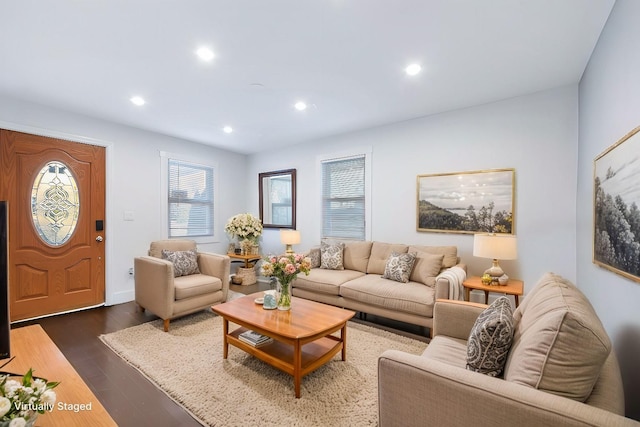 living area featuring dark wood-style floors and recessed lighting