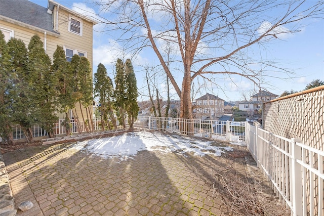 view of yard with a residential view and fence