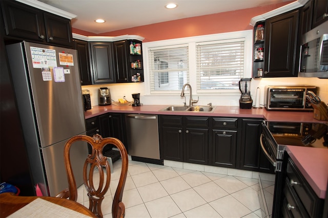 kitchen with light tile patterned floors, a toaster, a sink, appliances with stainless steel finishes, and open shelves