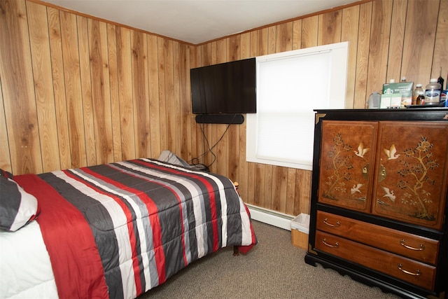 bedroom featuring a baseboard heating unit, dark carpet, and wooden walls