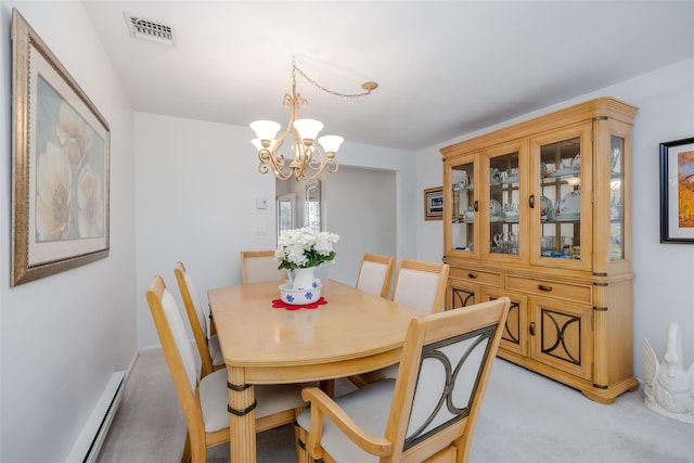 dining area featuring a baseboard heating unit, light colored carpet, visible vents, and a notable chandelier