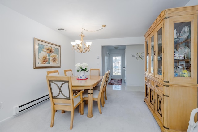 dining space with light carpet, a baseboard radiator, visible vents, and an inviting chandelier