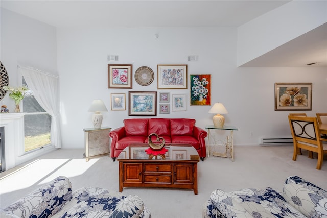 living room with light carpet, a fireplace, and visible vents